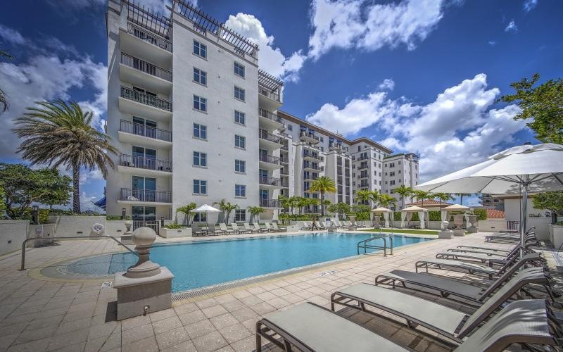 a pool in front of a building