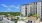 wide exterior view showing building, local community and some views of outdoor pool and courtyard