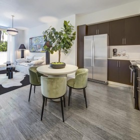 The essence of exceptional living a kitchen with a table and chairs