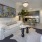 a living room with a white couch and a table