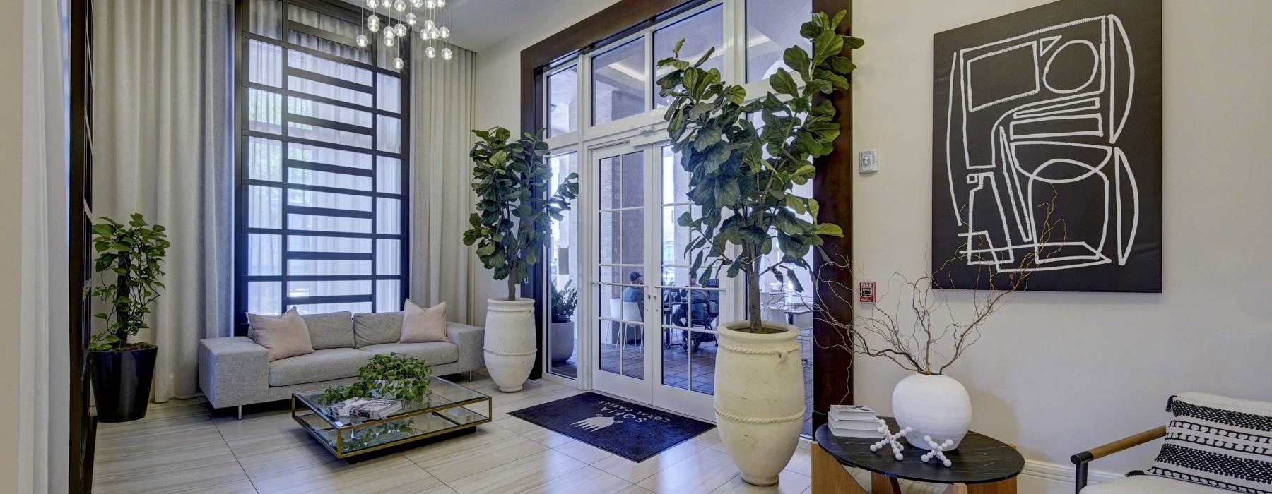 a living room with a large glass door