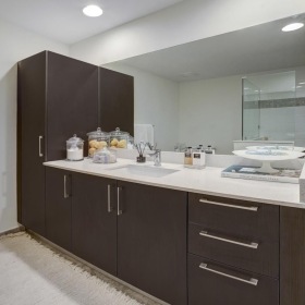 The essence of exceptional living a bathroom with a large mirror